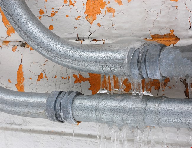 Gebarsten leiding, vorst, lekkage, Polygon