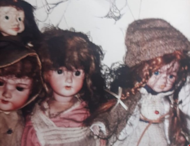 Poppen met roetschade